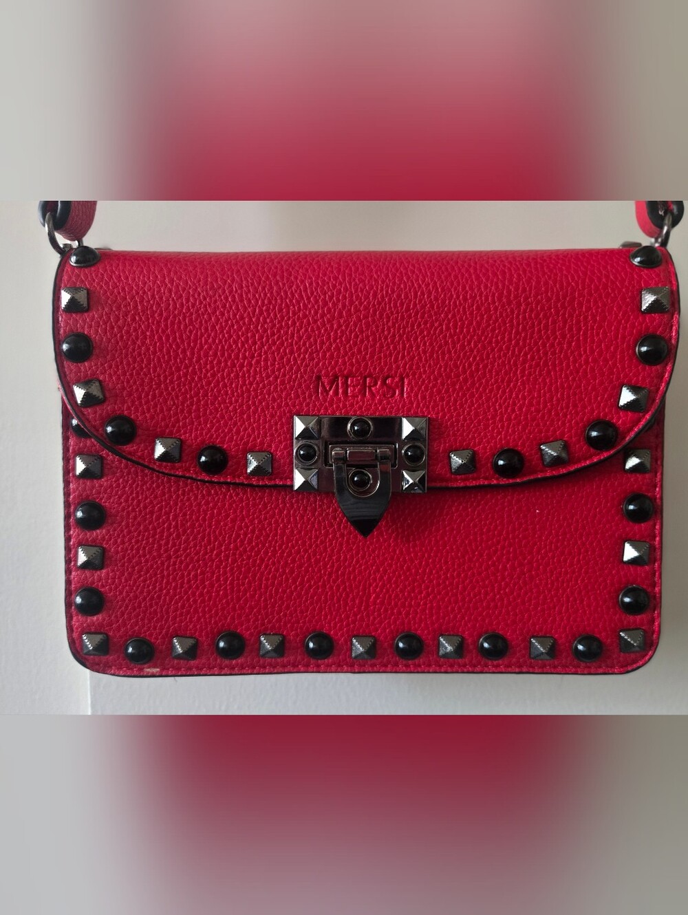MERSI's coveted Ruby Red Studded Crossbody Bag with Multicolor Geo Strap - Picture 2 of 8